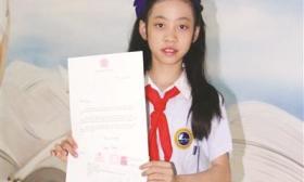 组图：小学生给英国女王写信 昨天她收到女王回信