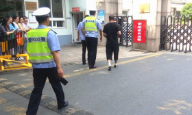 又有考生忘带准考证 警车一路鸣笛9里路用时12分钟没误事