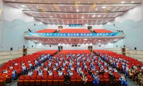 “请党放心，冬奥有我” 北京交大首批冬奥志愿者戴中国结启程