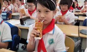 推广国家“学生饮用奶计划”，助力学子健康成长