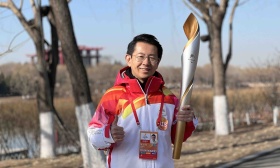 火炬手梁小昆：感受火炬传递中的“无障碍”交流