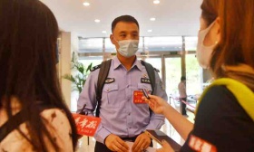“京城最帅交警”孟昆玉：上午为中考护航，下午赶赴党代会报到