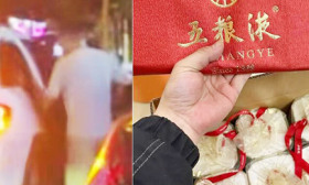 闹大了！家长“做局”偷拍教师收五粮液画面，录音并举报