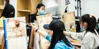 美术老师跨界街头卖炒饭，日赚八百引热议