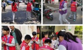 济南高新一实验学子参与社区活动，传承红色精神。