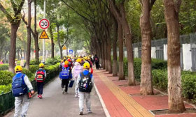 济南市市中区育秀小学 “300 米儿童友好路” 家校轮值守护